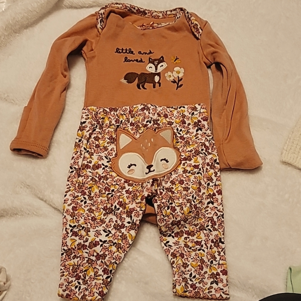 Newborn Carter's Long Sleeve Onesie and Pant Set.